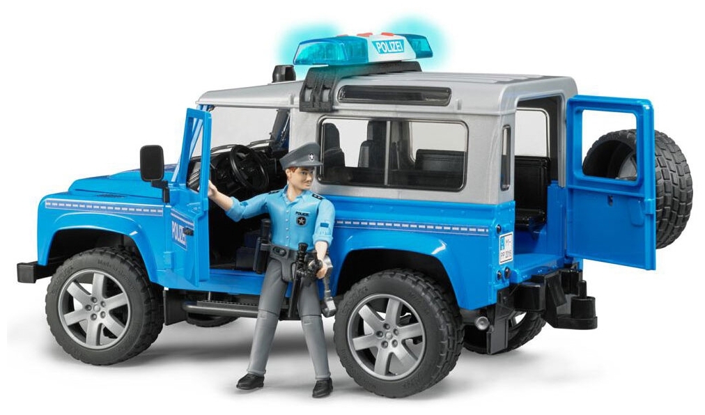 Фотография Внедорожник BRUDER Land Rover Defender Station Wagon Полицейская с фигуркой 02-597